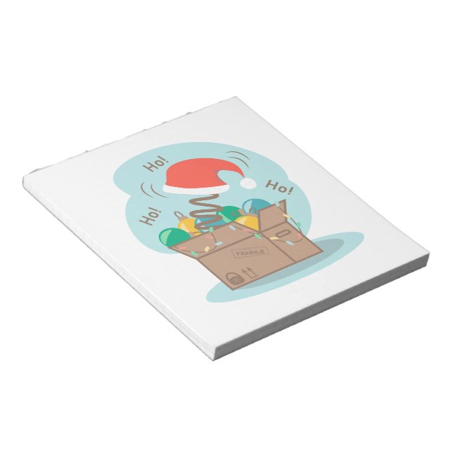 Craft box with Christmas decoration and Santa hat  Notepad (Angled)