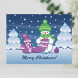 Crafty Snowman Knitting Scarf Holiday Postcard<br><div class="desc">Vector illustration of two adorable cartoon snowmen dressed in knitted hats and scarves. The big crafty snowman is knitting an oversized scarf for the little one. The scarf is already wrapped several times around the cute little snowman.</div>