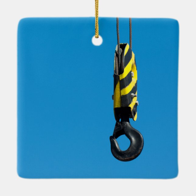 Crane hook with yellow and black stripes hanging ceramic tree decoration (Back)