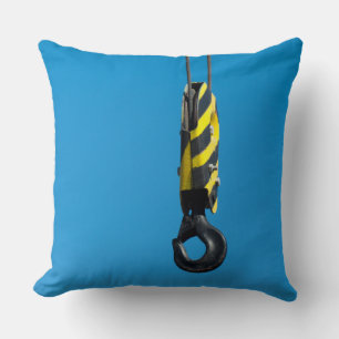 Crane hook with yellow and black stripes hanging cushion