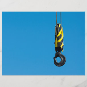 Crane hook with yellow and black stripes hanging flyer