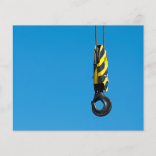 Crane hook with yellow and black stripes hanging flyer