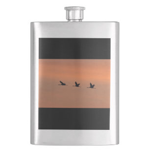 Cranes at sunrise hip flask