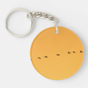 Cranes at sunrise key ring