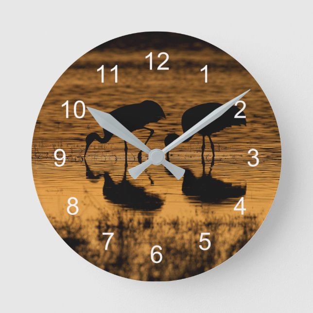 Cranes Silhouetted by the Sunset Round Clock (Front)
