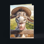 Crazy Birthday Donkey Wearing a Hat Card<br><div class="desc">A donkey with a comical exaggerated smile stands behind a wooden fence,  wearing a straw hat for getting older birthday.
All text is editable.</div>