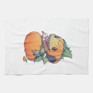 crazy pumpkin trying to eat spooky tea towel
