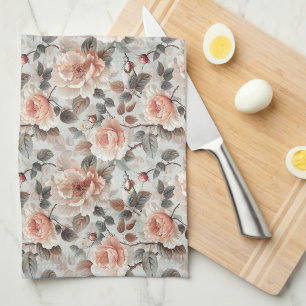Cream flowers with grey leaves on a light grey tea towel