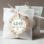 Cream Gold Floral Greenery Heart Wedding Monogram Classic Round Sticker<br><div class="desc">Wedding accent sticker features a monogram of the bride and groom's initials and wedding date that can be personalised in rich green and dark grey / soft black colours. A gold heart accents the design and an elegant floral watercolor wreath frames the text with painted roses, ranunculus flowers, and foliage...</div>