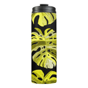 Creative seamless pattern with tropical leaves and thermal tumbler