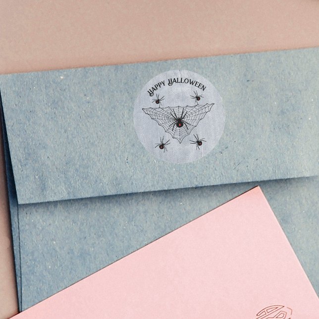 Creepy Crawling Black Widow Spiders Web White Classic Round Sticker (Black widow spiders in black web with red hourglass marks on rustic white Halloween stickers.)