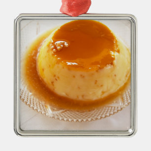 Creme caramel type of pudding with caramel metal tree decoration