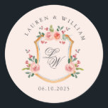 Crest with monogram pink wedding  classic round sticker<br><div class="desc">Elegant watercolor crest with soft floral on a pale pink background with couples initial round sticker for romantic wedding.</div>