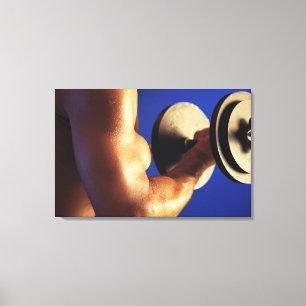 Cropped shot of man lifting weights canvas print