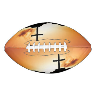 Cross silloette at dusk football