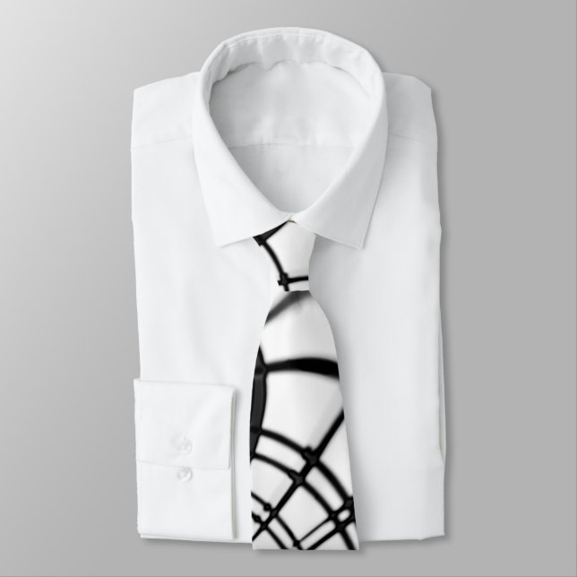 Crossed grey lines remind us of drawings of claw tie (Tied)
