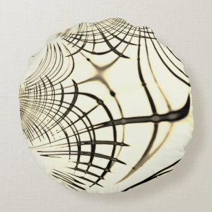 Crossed nut-brown or khaki curved traces up beige round cushion