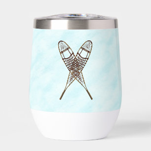 Crossed Snowshoes On Snow