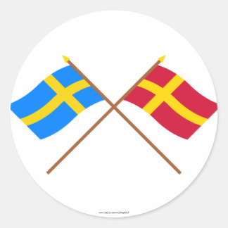 Crossed Sweden and Skåneland landskap flags Classic Round Sticker