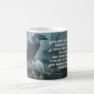 Crow sitting on a skull with a gothic message  coffee mug