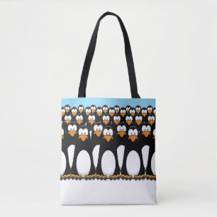 Crowd of Funny Cartoon Penguins on Snow Tote Bag
