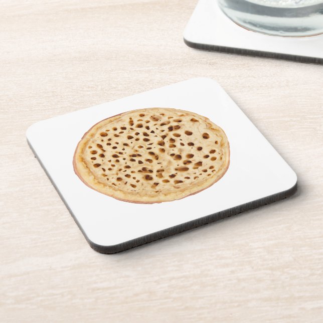 Crumpet on white coaster (Left Side)