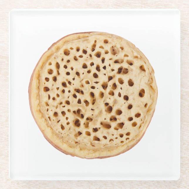 Crumpet on white glass coaster (Front)