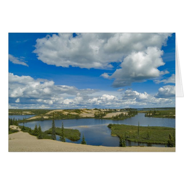 Cumulus clouds float above lakes, Northwest (Front Horizontal)