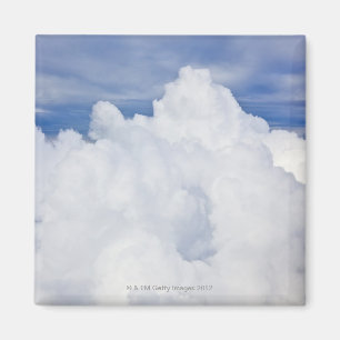 Cumulus clouds viewed from high angle. magnet
