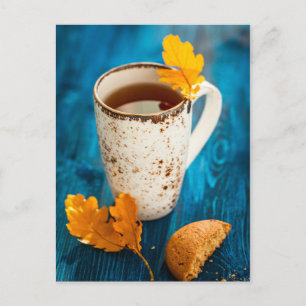 Cup Of Tea And Autumn Leaves On Blue Wooden Postcard