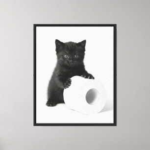 Curious Black Kitten Guarding Toilet Paper Roll On Canvas Print