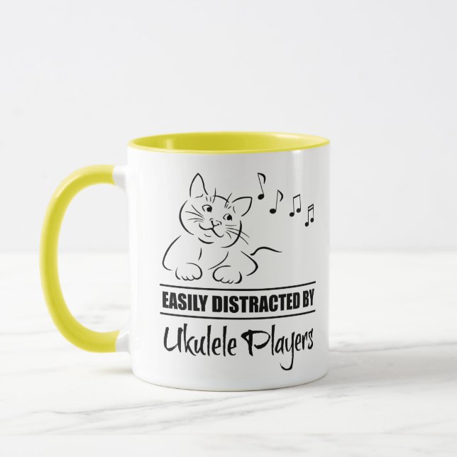 Curious Cat Easily Distracted by Ukulele Players Mug (Left)
