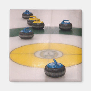 Curling action magnet