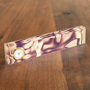 Curved brownish red or burgundy shapes, beige tone nameplate
