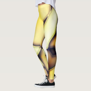 Curved smooth golden lines over burnt beige leggings