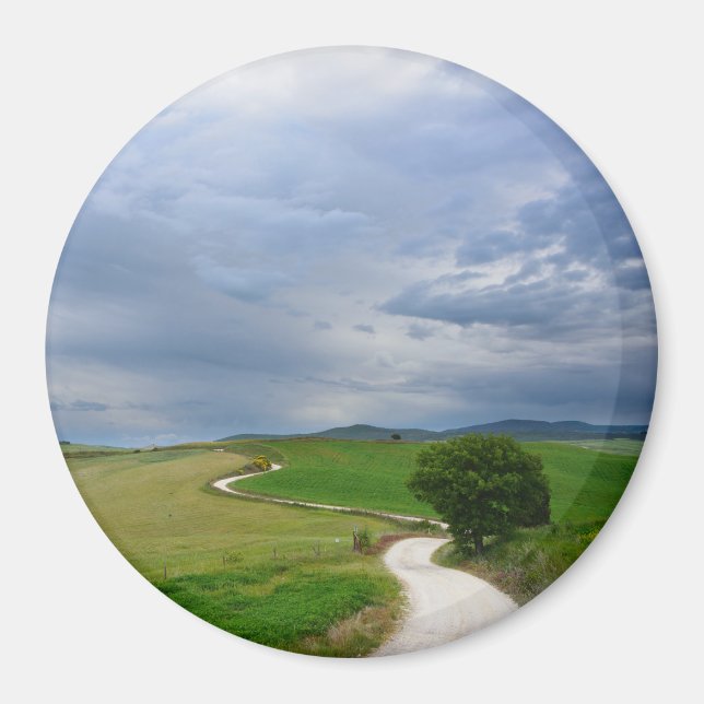 Curvy road towards a destination round magnet (Front)