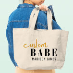 Custom Babe Funny Saying Personalised Name Large Tote Bag<br><div class="desc">Custom Babe Funny Saying Personalised Name Tote Bags features a simple design with the text "custom babe" in modern black and gold calligraphy script typography and personalised with your name. Perfect for a fun gift for mum, best friends, girlfriend, for birthday, Christmas, holidays, Mother's Day and more. Designed by Evco...</div>