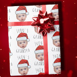 Custom Baby Face Santa Hat Christmas Photo Wrapping Paper<br><div class="desc">Funny Custom Baby Face Santa Hat Christmas Photo Wrapping Paper , Replace the face of this elf with your favourite photo (make sure to crop as much to the face as possible and use an app to remove the background) and personalise this funny Christmas Holiday Wrapping Paper with your kid,...</div>
