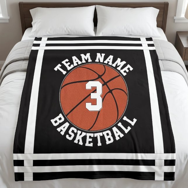 Custom Basketball Team Name & Player Number Sports Fleece Blanket (Personalized basketball blankets with custom team name and player number, on bed.)