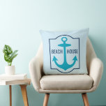 Custom Beach House Teal and Navy Blue Anchor Cushion<br><div class="desc">Modern and stylish custom beach house pillow design features a nautical inspired boat anchor design in navy and teal blue colours and custom text that can be personalised with the city and state location of your beach house. The light sky blue background colour can be customised to coordinate with your...</div>
