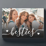 Custom Besties Best Friends Photo Plaque<br><div class="desc">Create a custom keepsake with this personalised photo home decor display. The front features your favourite photo with the word "besties" written across the bottom in a flowing script font, accented by a few small heart details. A subtle black gradient sits behind the text to help it stand out without...</div>