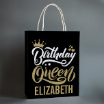 Custom Birthday Queen Black and Gold Personalised Medium Gift Bag<br><div class="desc">Make the birthday celebration extra special with our Custom Birthday Queen Black and Gold Personalised Medium Gift Bag. Perfect for milestone birthdays like 16th, 21st, 30th, or 40th, this stylish gift bag adds an elegant touch to your birthday gift presentation. The sleek combination of black and gold, along with the...</div>