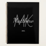 Custom Black Monogram Initial Name Minimalist Year Planner<br><div class="desc">Personalise and add your name,  monogram initials,  and year. (any year) golden and white letters. The name is written with a hand lettered style script.</div>