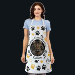 Custom Cattery Maine Coon Photo Apron<br><div class="desc">Promote your cattery in style with this fully customizable photo apron. Designed specifically for professional cat breeders and Maine Coon lovers, this apron features a central circular frame to showcase your favorite feline’s portrait. The design is accented with a playful pattern of gold and black paw prints and delicate hearts,...</div>