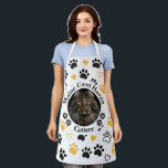Custom Cattery Maine Coon Photo Apron<br><div class="desc">Promote your cattery in style with this fully customizable photo apron. Designed specifically for professional cat breeders and Maine Coon lovers, this apron features a central circular frame to showcase your favorite feline’s portrait. The design is accented with a playful pattern of gold and black paw prints and delicate hearts,...</div>
