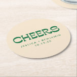 Custom Cheers Green Art Deco Chic Modern Wedding Round Paper Coaster<br><div class="desc">A chic wedding coaster featuring a soft champagen green background with vintage-inspired typography in green. Customisable with names and a date,  this elegant design is perfect for wedding receptions,  bridal showers,  or anniversary celebrations. A stylish favour or keepsake for guests to remember the special day.</div>