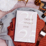 Custom Cute Pink Minimal 2025 Calendar  Planner<br><div class="desc">Stay organised in style with this elegant 2025 Zazzle planner. Featuring a modern, minimalist design with soft, earthy tones and a bold "2025" on the cover, this planner is perfect for keeping track of your daily schedule, goals, and important events. The sleek spiral binding ensures easy use, while the customisable...</div>