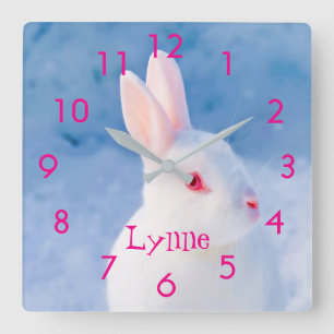 Custom cute white rabbit on blue snow background square wall clock