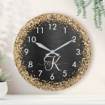 Custom Gold Glitter Black Sparkle Monogram Round Clock<br><div class="desc">Easily personalise this trendy elegant clock design featuring pretty gold sparkling glitter on a black brushed metallic background.</div>