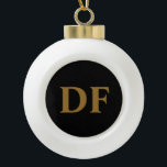 Custom Gold Monogrammed Ceramic Ball Christmas Ornament<br><div class="desc">Add a touch of personalised elegance to your holiday decor with this "Custom Black With Gold Initials Christmas Ornament". This ornament features a black design with gold initials, making it a standout piece on your tree. Customise it with your initials or those of a loved one, creating a cherished keepsake...</div>